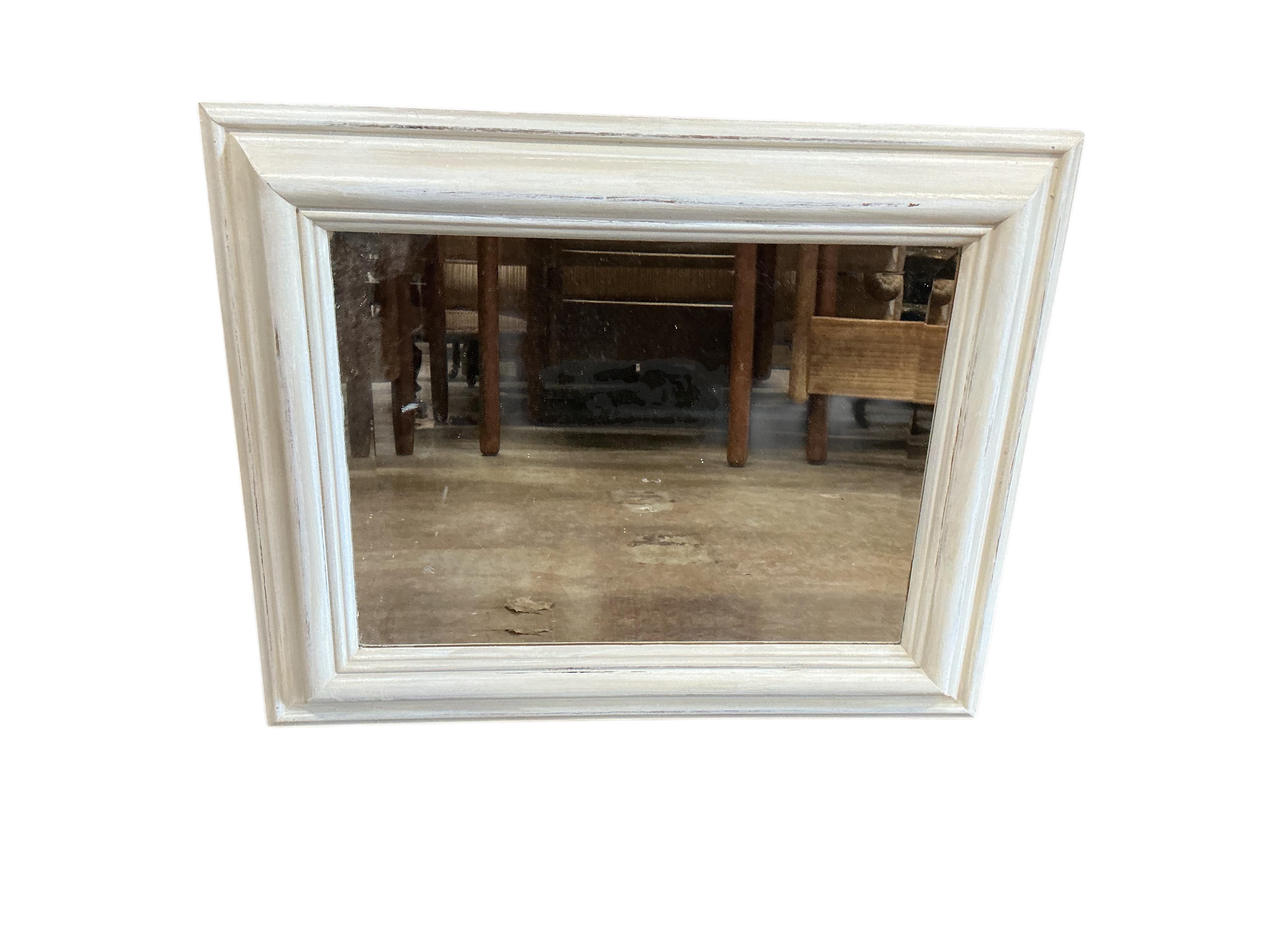 Four contemporary painted rectangular wall mirrors, largest 49cm wide, 103cm high